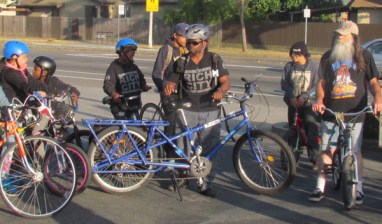Najari Smith, center, leads a moment of silence at the Ride of Silence in Richmond. Photo: Melanie Curry/Streetsblog