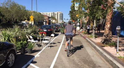 Maybe pop-up protected bike lanes like these on Lankershim Blvd in North Hollywood can become permanent, with new ATP funding on the way. Photo by Joe Linton/Streetsblog L.A.