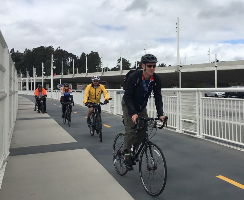 Caltrans Director Malcolm Dougherty and Caltrans District 4 Director Bijan Sartripi, from right, check out the bike/pedestrian path on the eastern span of the Oakland Bay Bridge. Photo: Melanie Curry/Streetsblog