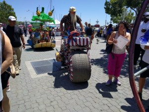 A view of the parade of outrageous bikes at Pedalfest. (In the back is one of the amphibious bikes.) Photo Streetsblog/Roger Rudick