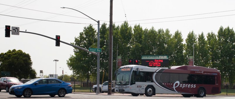 A Metro Express bus crosses the intersection at Martin Luther King Jr. Way and Airport Way in Stockton. Photo by Minerva Perez