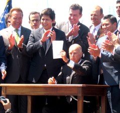 Governor Brown at the signing ceremony this year for the cap-and-trade extension. Photo: Melanie Curry/Streetsblog
