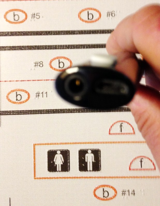 The tactile maps have a key that can be read in braille or by pressing an audio "smart pen" to the paper to receive audio instructions. Photo courtesy Joni Bauer