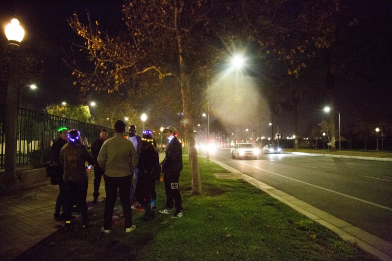 Walking group makes a stop on Bristol Street to talk about vacant lots created by widening the street. Image: Santa Ana Active Streets