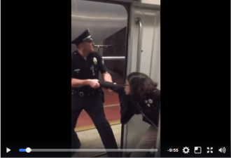 Officer drags Bethany Nava off the train at Westlake/MacArthur Park for not removing her foot from the seat where it was propped up. [Image: still from video taken by Brock Bryan.]