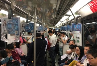 Transit riders in Shanhai. All photos by Ryan Snyder