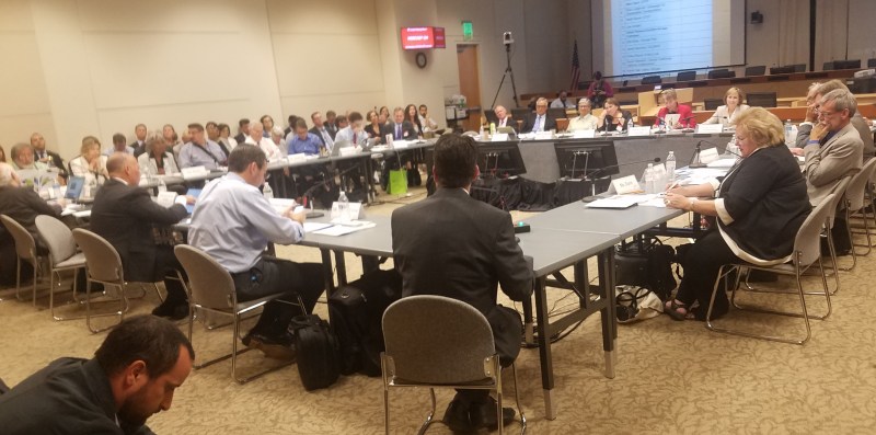 Transportation commissioners and Air Resource boardmembers listen to public testimony at their historic first meeting. Photo by Bryn Lindblad