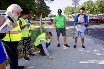 California Walks discusses intersection design improvements during a walk assessment in Fresno. Image: SafeTREC