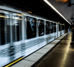 train going by in a station