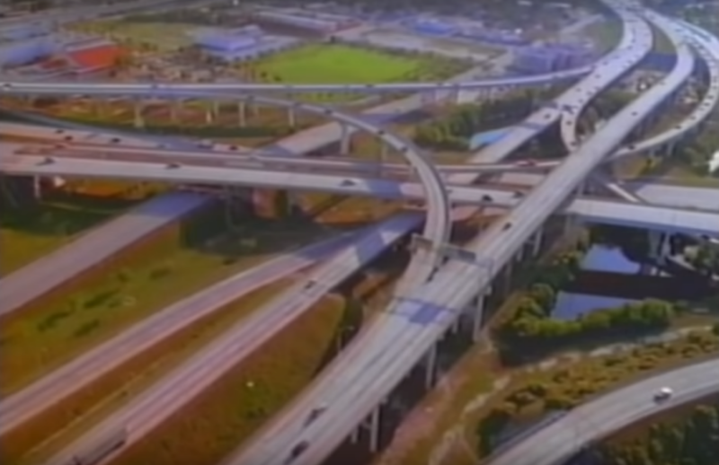 Still from Divided Highways, showing the glory and destructive nature of our highway mania.