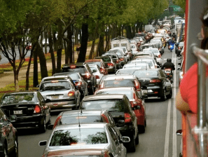 street packed solid with car traffic