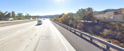 I-5 through Santa Clarita - one car in teh lane to the left, railing on the right