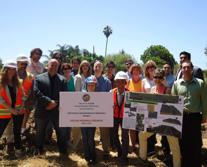Weiss, center in the blue shirt, stands behind his son at the groundbreaking for the Expo Greenway in 2014. More on the Greenway's opening, in 2020/2021 here : https://la.preprod-streetsblog.alley.ws/2021/01/25/the-westwood-neighborhood-greenway-is-now-complete/