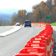 Advocates mourned a disappointing infrastructure bill that would put way more construction barriers on newly-expanded highways than barrier-protected bike lanes in cities and towns. Image: NC DOT, cc